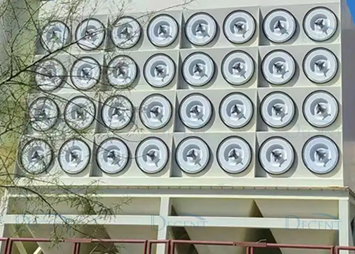 Close-up of multiple circular filter elements in a DECENT industrial dust removal system project
