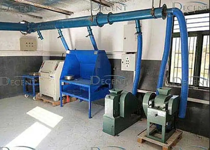Qingdao Decent Group's sample preparation laboratory equipment in Tanzania, featuring crushing and pulverizing machines with a dust collection system.
