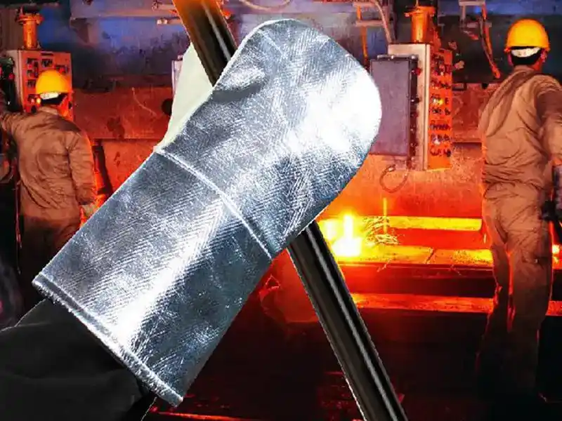 DECENT Heat Resistant Aluminized Glove in a metallurgy plant – Silver - coated glove gripping hot equipment, shielding against radiant heat (1650℃+) and molten splashes during metal smelting.