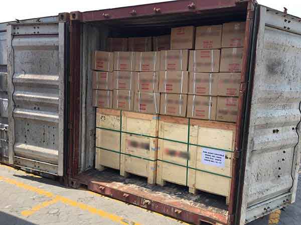 Shipping container loaded with DECENT clay crucibles