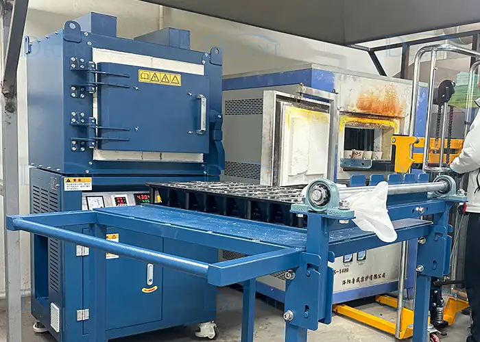 Qingdao Decent Group fire assay laboratory equipment, including a large furnace and a sample handling system, representing an upgrade for enhanced efficiency and precision.