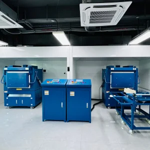 DECENT modern automated fusion and cupellation furnaces in a clean laboratory setting, used for fire assay and precious metal analysis.