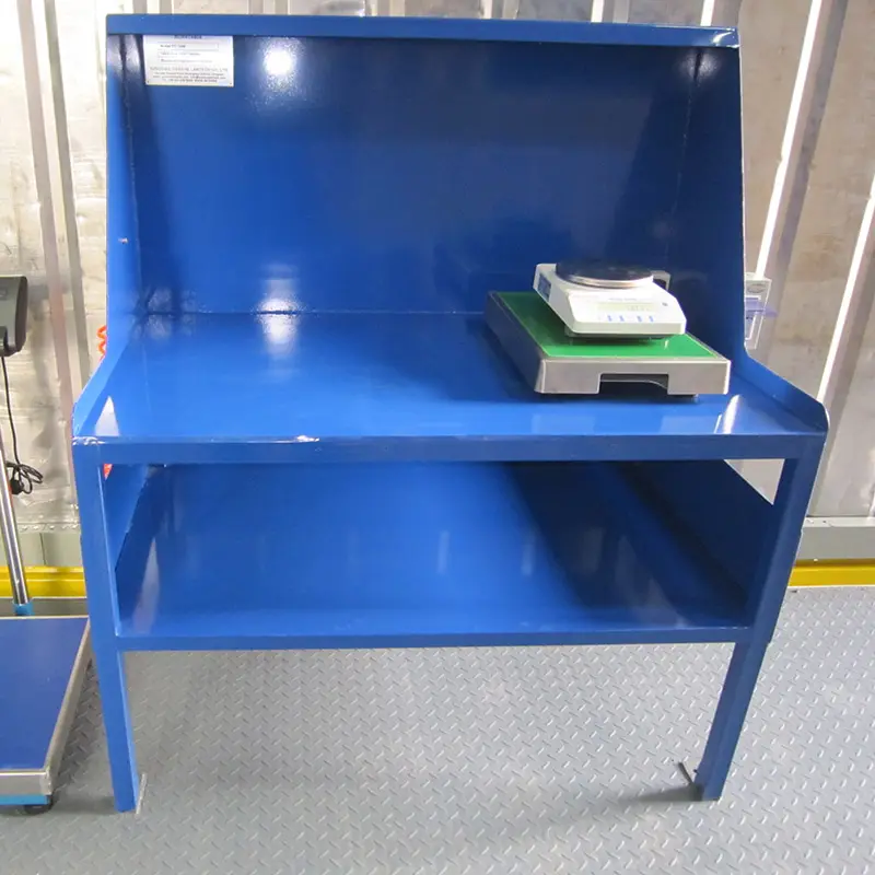 DECENT Group blue weighing station with scale, showing sturdy metal construction and lower storage shelf for laboratory or industrial use.