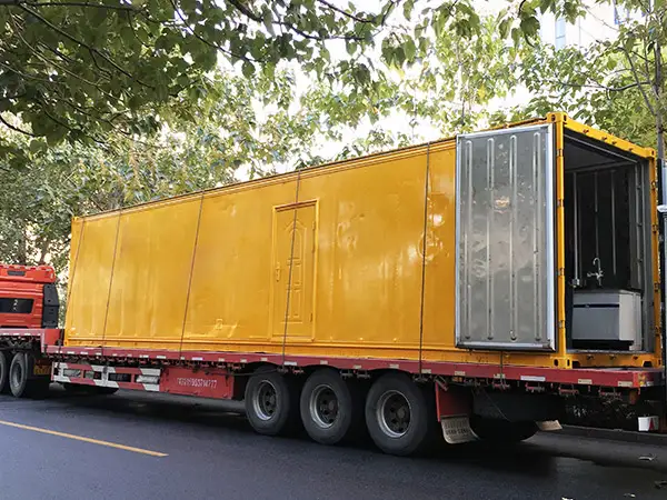 DECENT Environmental Monitoring Lab container exterior and interior with analytical instruments for environmental testing