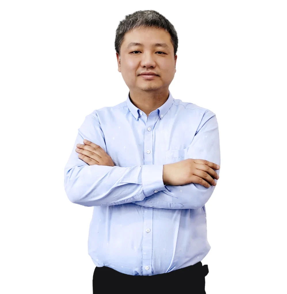 Portrait of Hyde Wang, Group President and CEO of DECENT, standing with arms crossed.