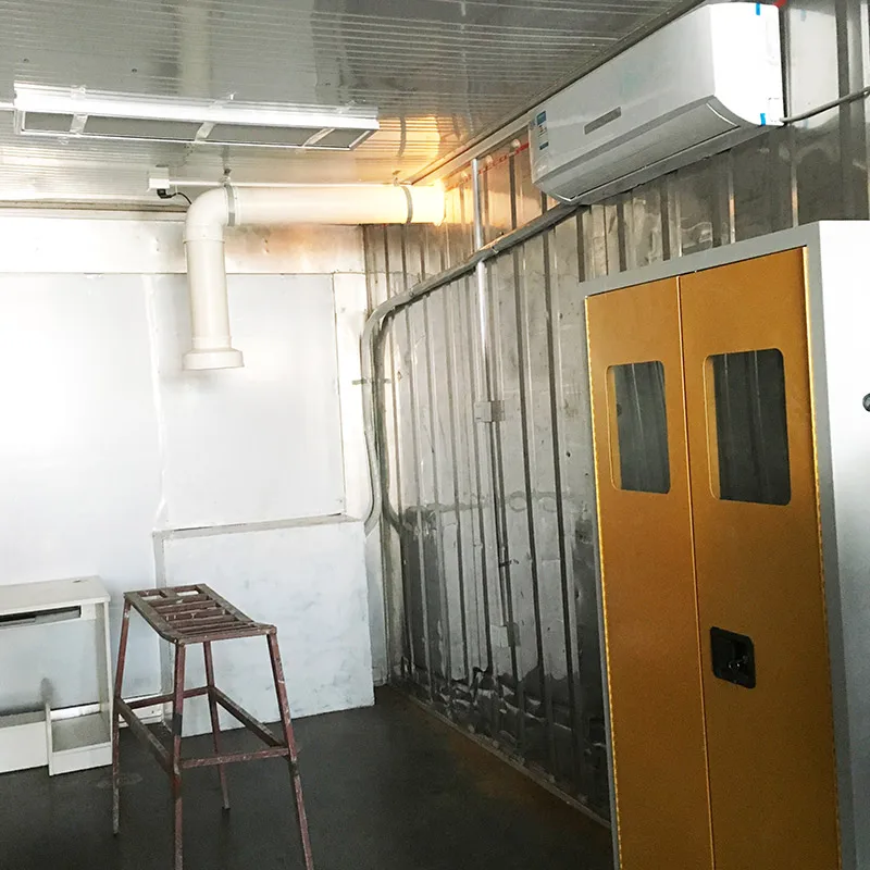 Interior of a china containerized laboratory project showing integrated yellow and blue equipment and a control panel.