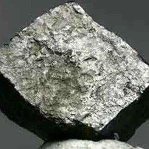 A shiny, cubic, lead-gray colored piece of the mineral galena, showcasing its metallic luster and perfect cleavage.