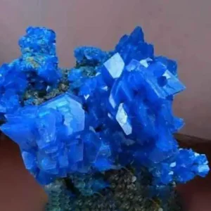 A stunning cluster of vibrant blue chalcanthite crystals, a hydrated copper sulfate mineral sometimes referred to as 'Bile crystals'.