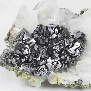 A dense cluster of shiny, metallic-gray galena crystals, a lead sulfide mineral, in a perfect cubic formation on a white matrix.